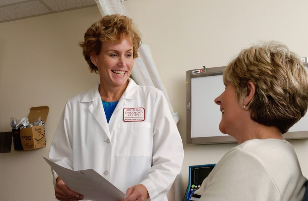 Friendly doctor consultation with patient